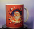 11oz red ceramic mug with 3D Santa Claus bursting through design and Christmas village scene