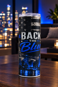 Back the Blue tumbler in a blue-lit city lounge setting