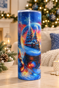 Christmas train snow-globe glitter tumbler in a cozy holiday setting