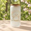 Fluffy owl cup in a soft woodland setting