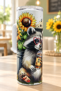 Handled raccoon tumbler in a sunny café setting