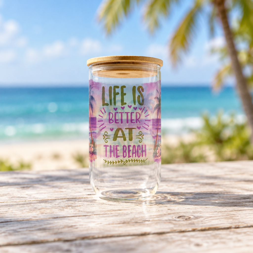 Life Is Better at the Beach clear glass cup wording view in a beach setting