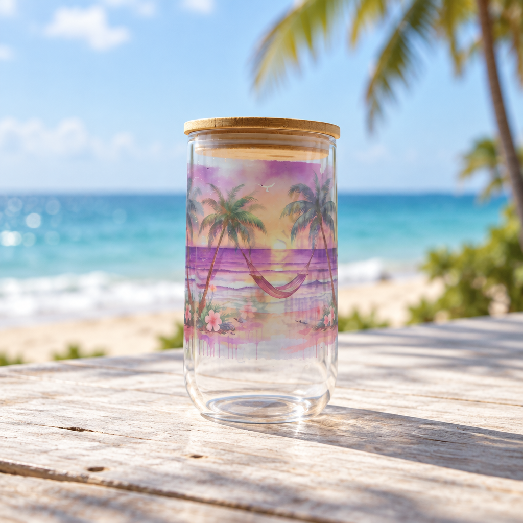 Beach clear glass cup palm tree and hammock view in a beach setting