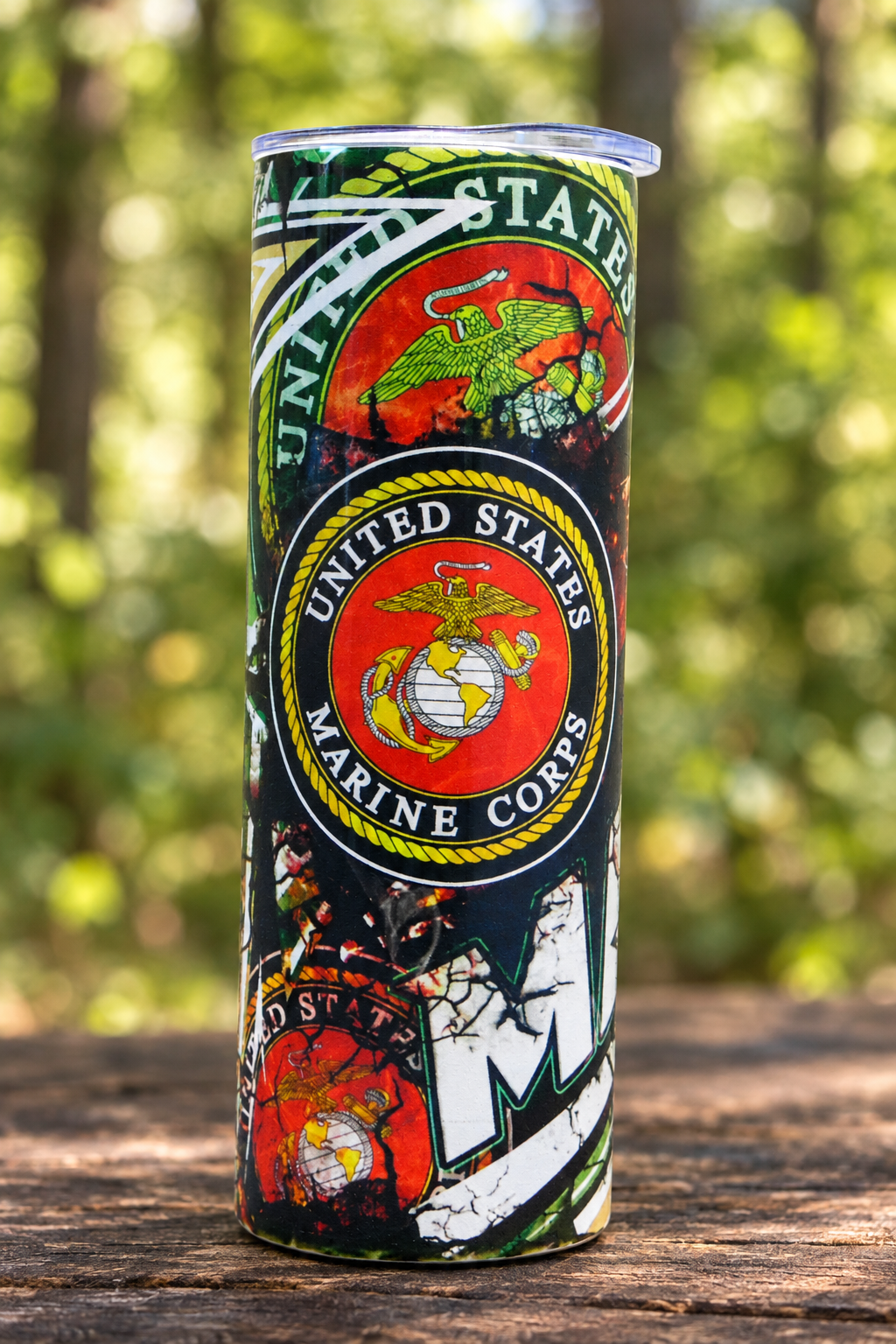 Marine Corps emblem tumbler in a woodland setting